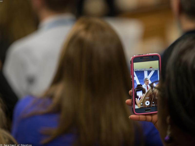 Group of students collaborating in a library, sharing knowledge